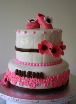 Baby shower cake with pink booties