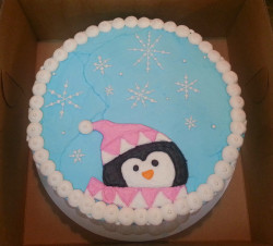 Birthday cake with cute penguin